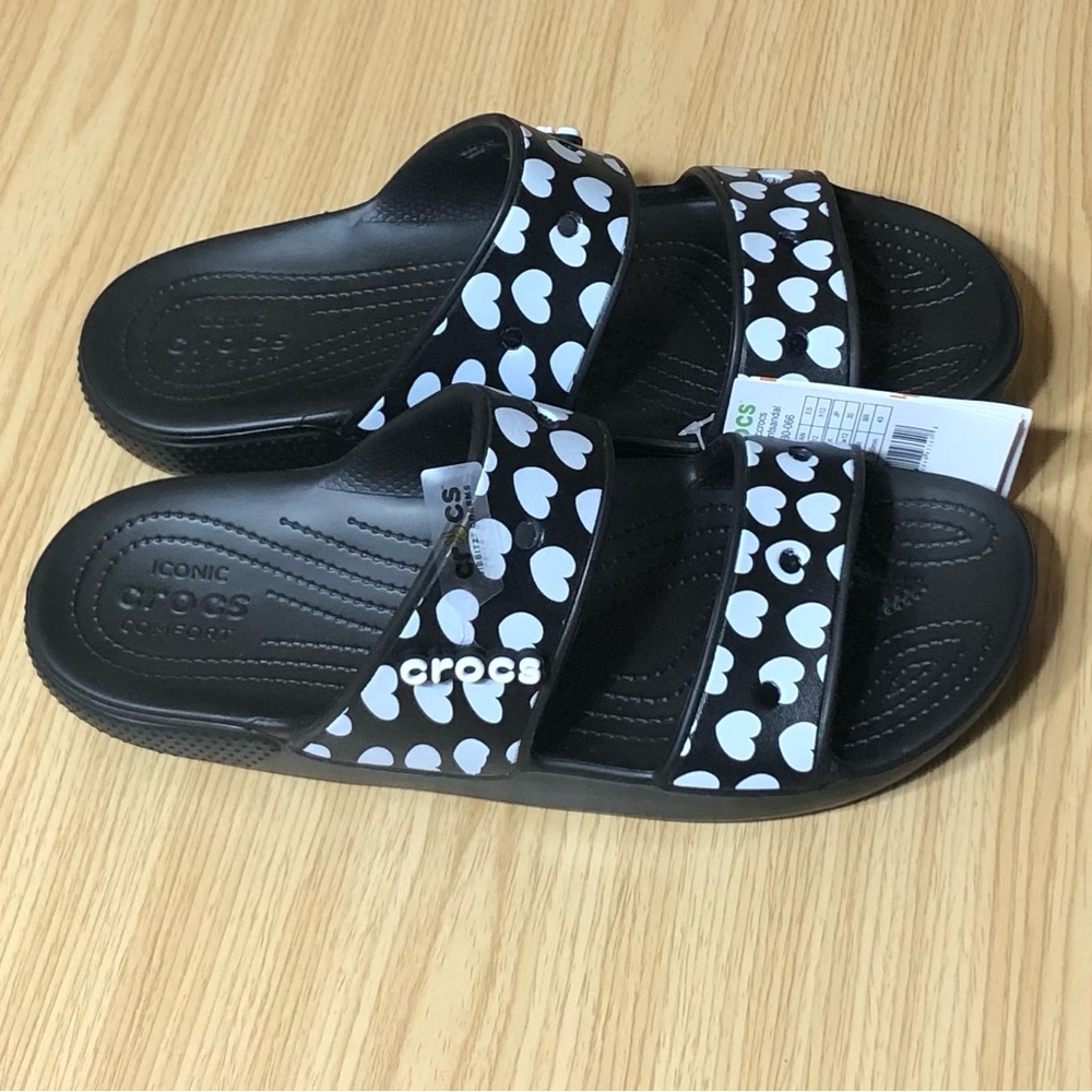 Classic Crocs Heart Print Sandals Black White Slip On Comfort NWT Women Size 12.